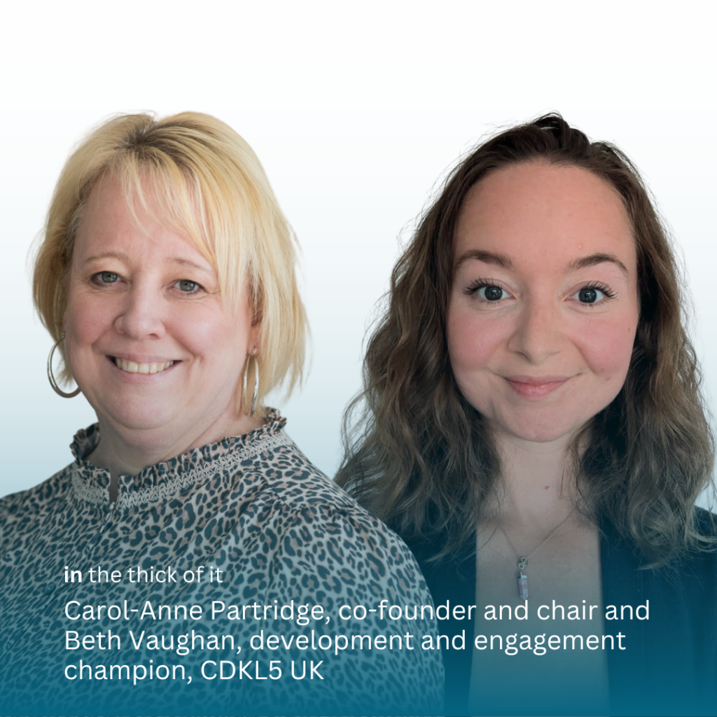 Image is of Carol-Anne Partridge on the left smiling into the camera, wearing a leopard print top and large silver earrings. She has short blond hair. On the right is Beth Vaughan, smiling into the camera, wearing a pink pendant drop necklace and dark top. She has longer than shoulder length brown wavy hair. The background is white.