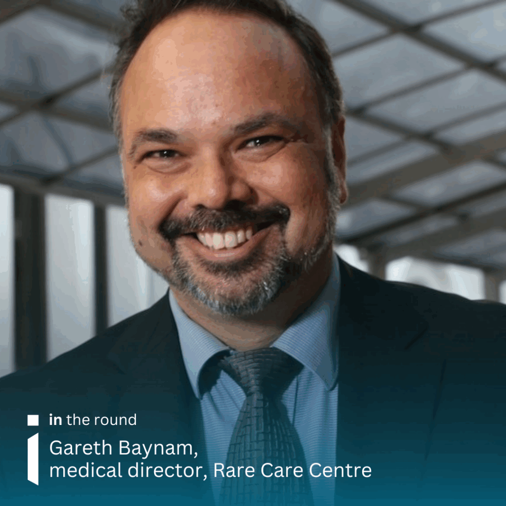 Headshot image of Gareth Baynam smiling into the camera.