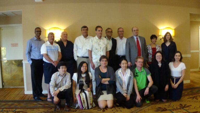 Carole, Simons Searchlight participant with researchers at a Jordans Guardian Angels event