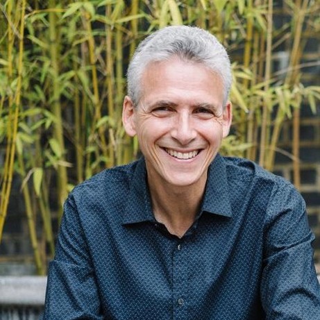 Headshot image of Dr Simon Lande