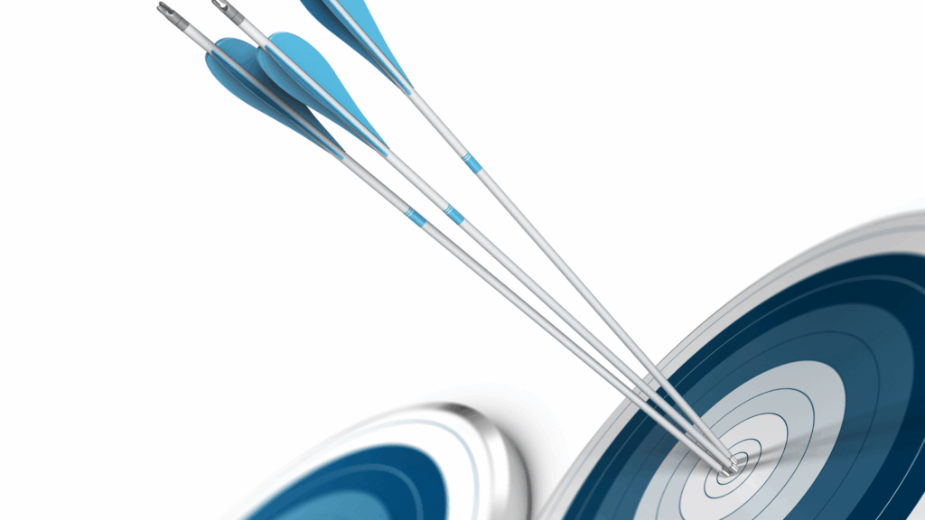 Image of arrows hitting the centre of an archery board