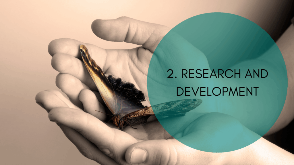 Image of hands holding a butterfly to indicate growth, development and protection