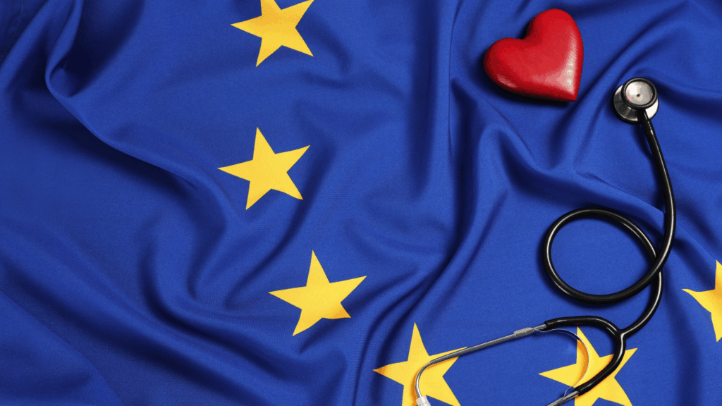 Photo of the European Union flag with a stethoscope and red heart on top