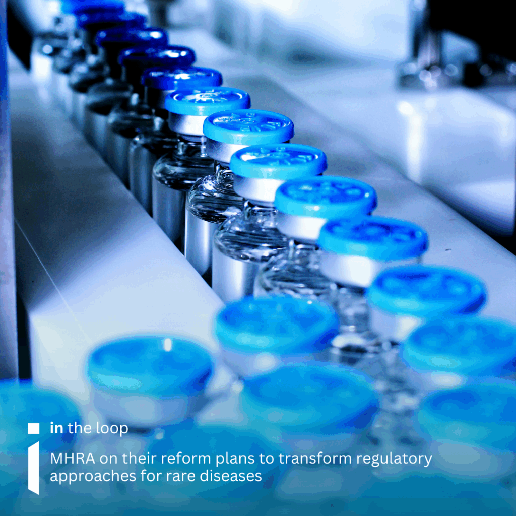 Image of medicine bottles on a production line to denote drug development