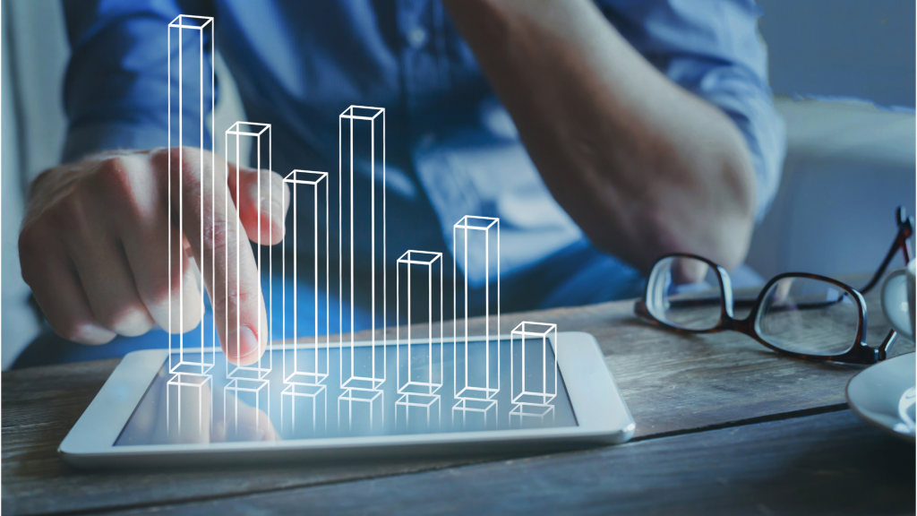 Image of someone with a virtual bar graph in front of them to denote capital funding