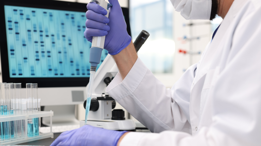 Image of a scientist in a lab doing genetic testing