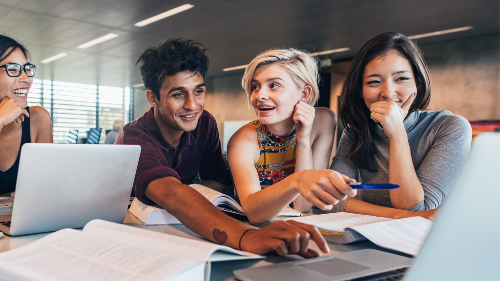 Photo of a group of young people working together on a project