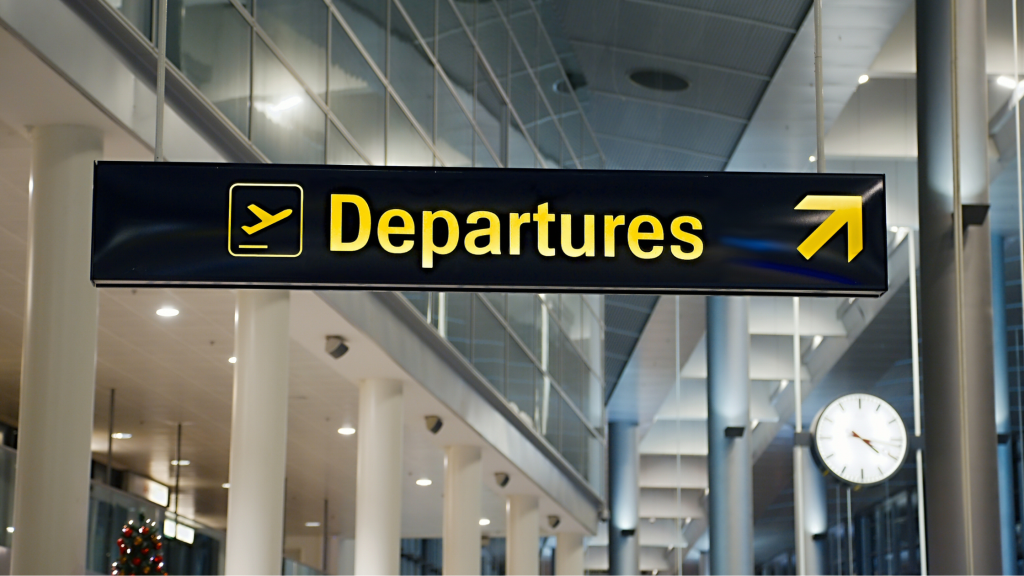 Photo of an airport departure sign