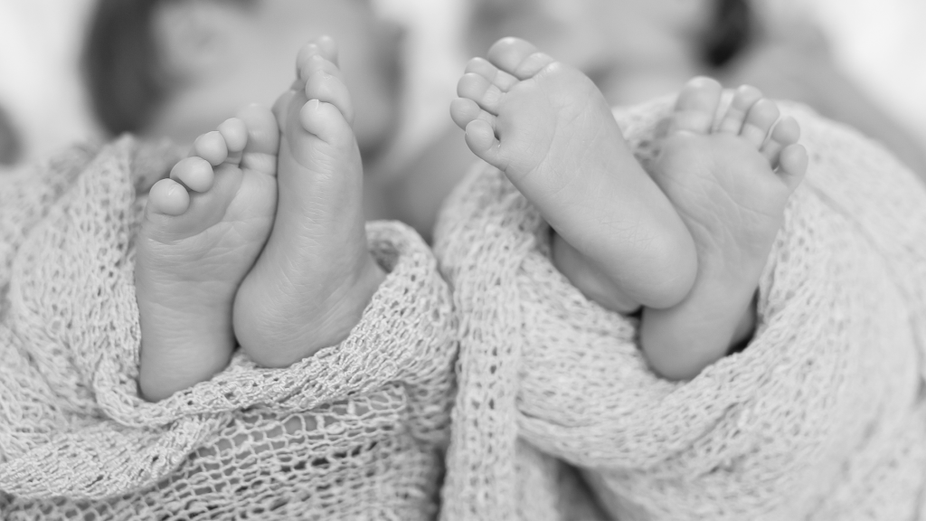 Photo of two newborn babies feet