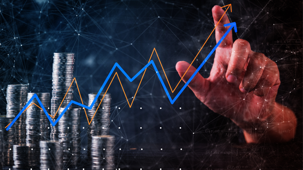 Photo of coins piled up and a digital profit graph going up, to denote profit.
