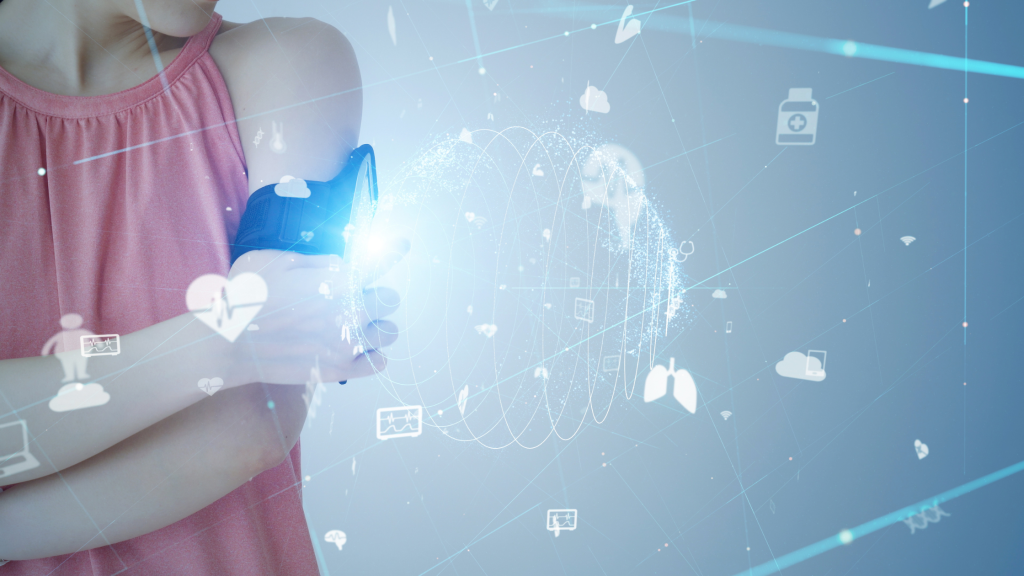 Photo of a lady with a wearable health tracker on her arm to denote one method of real-world evidence.