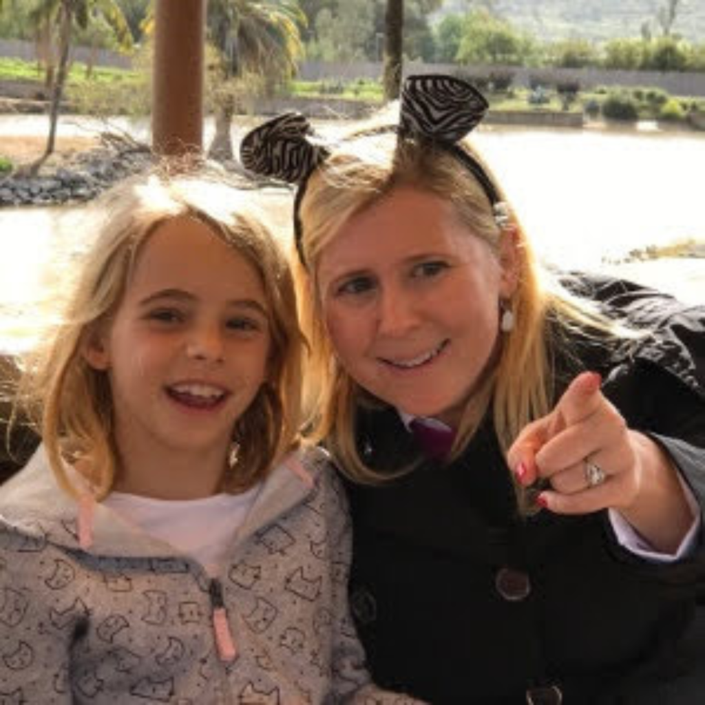 Image of Jennifer Sills and her daughter Juliet smiling at the camera