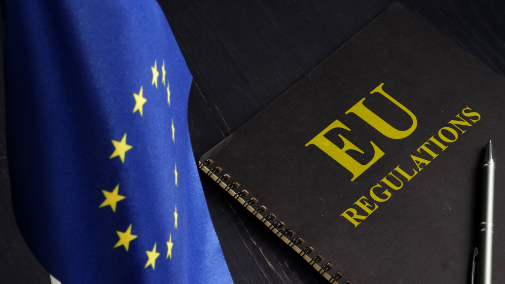 Image of the European Union flag and EU regulations booklet