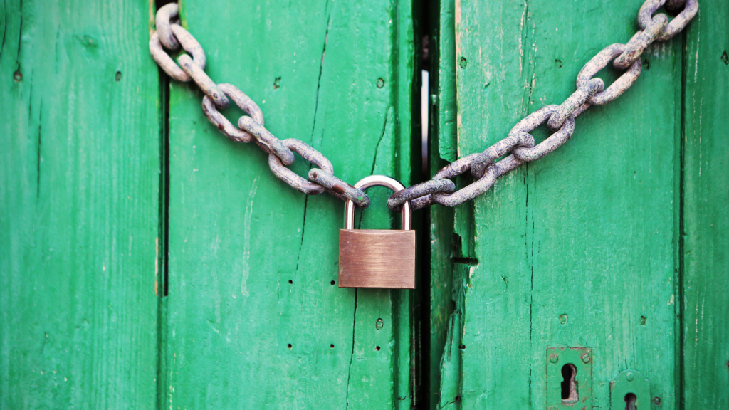 Photo of a padlocked door
