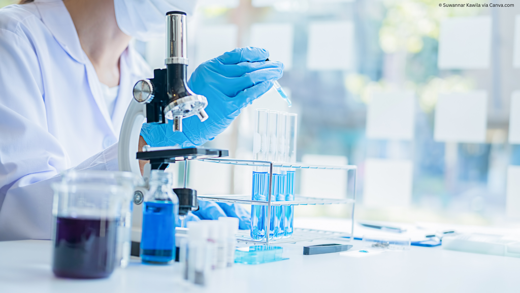 Image of a scientist using laboratory equipment