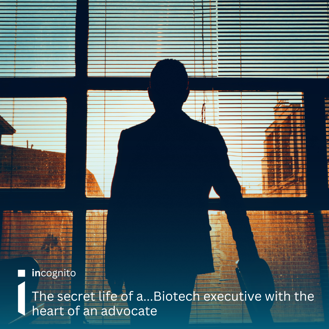 Image of a professional man looking out of the window