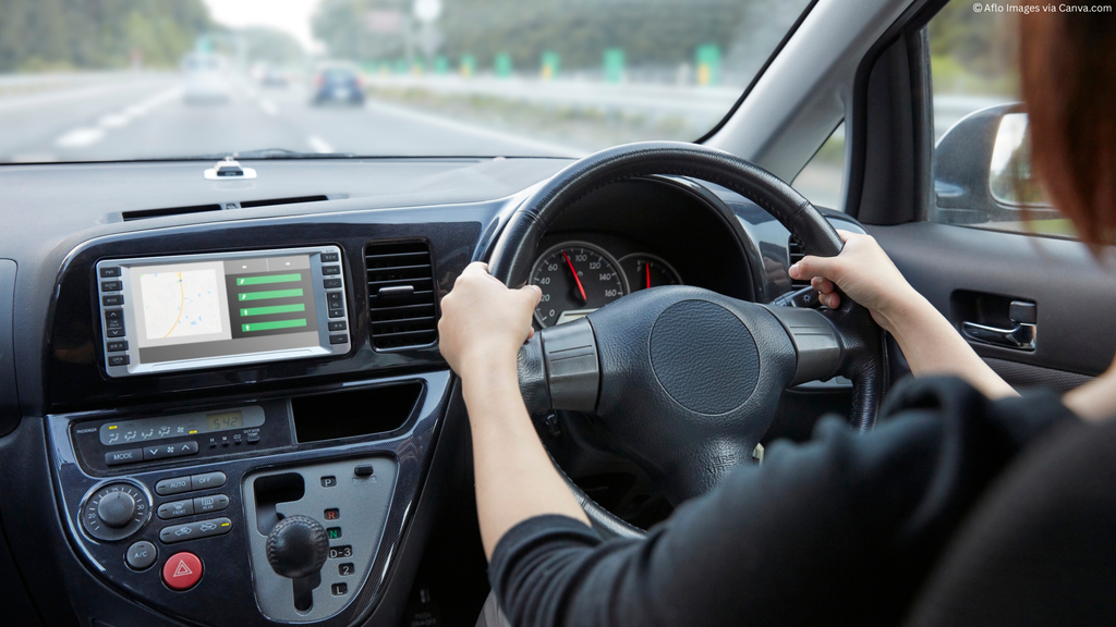 Image of a woman driving a car
