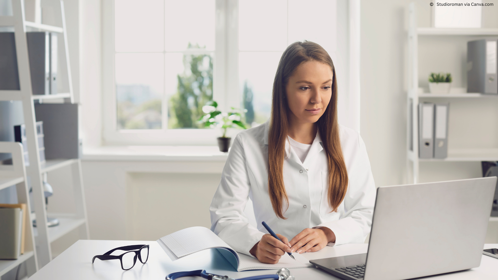 Image of a medical professional using a laptop